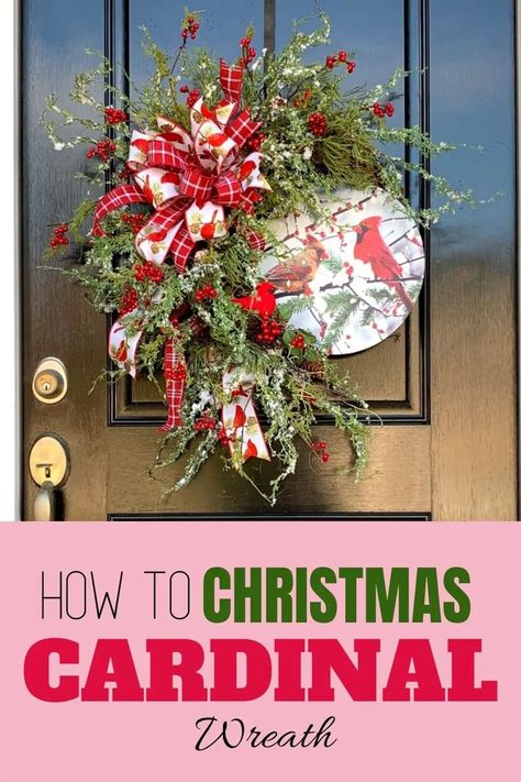 Grapevine wreath on a black front door 3/4 covered in winter greenery and red berries, a large bow in the top left of the wreath made from a red and white plaid print and a white ribbon with red cardinal pattern. The uncovered 1/4 of the wreath has a circular sign with the image of two cardinals in a snow tree branch. Wreath Making Business, Grapevine Christmas, Cardinal Wreath, Cardinal Decor, Cardinal Christmas, Christmas Cardinals, Xmas Wreaths, Wreath Diy, Christmas Arrangements