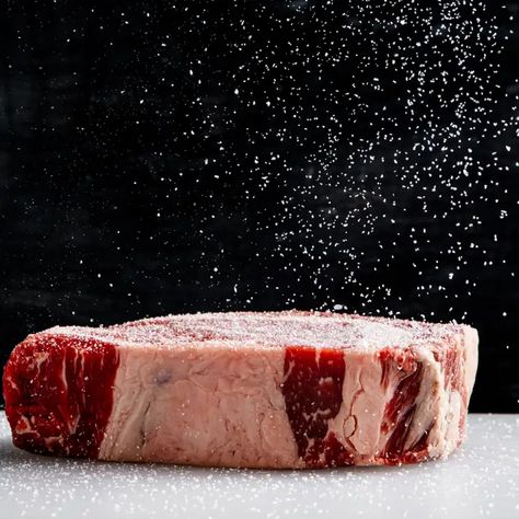 Some brands of kosher salt adhere more readily to meat, leading to more even seasoning.  Read on to learn more. Season Steak, Frozen Steak, Chicken Shrimp, Meat Seasoning, How To Cook Beef, America's Test Kitchen, Cooks Illustrated, Steak Seasoning, Food Science