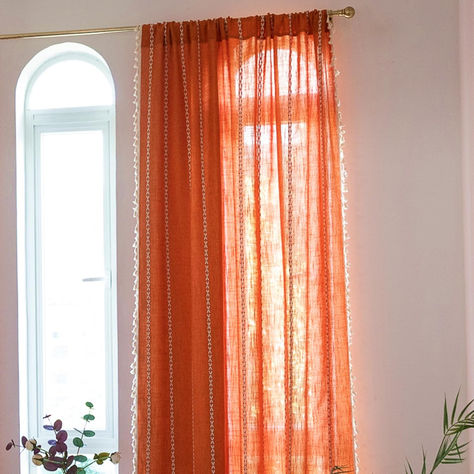 Enhance your space with boho chic curtain panel featuring elegant white stripes embroidered on weighted orange cotton linen. Adorned with handmade tassels on the edges, this 52"x84" panel adds charm and style. The top rod pocket design ensures easy hanging. It offers a semi-blackout feature, balancing light and privacy while allowing fresh air to flow. Bohemian Window Treatments, French Country Window Treatments, Country Window Treatments, Living Room Bohemian, Bohemian Embroidery, Room Bohemian, Orange Curtains, Bohemian Farmhouse, Boho Chic Design