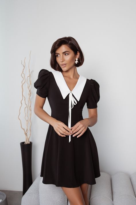 Channel modern sophistication with our Black Collared Short Sleeve Mini Dress - ELAGIA. The dress effortlessly combines timeless style and contemporary flair with its sleek black design and a charming collar. The short sleeves and mini length create a youthful yet refined look. #blackdress #dress #dresses #minidress #fashion #clothing #womenwear #womenfashion #stylish #chic #eveningdress #ootd Collar Dresses For Women, Collar Dresses, Zipper Lock, Backless Midi Dress, Blouse Sale, Silk Slip Dress, Puff Sleeve Dresses, Short Sleeve Mini Dress, Midi Dress With Sleeves