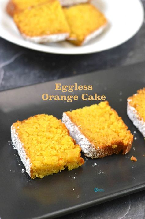 If you are an Orange Lover, then this would be perfect treat for you. This Eggless Orange Cake is a perfect Tea time Cake. The cake is perfectly balanced with just enough orange flavour, balanced with light sweetness. Easy to make and wonderfully soft, this citrusy teacake is a perfect tea-time treat Food Network Sugar Cookie Recipe, Eggless Tea Cake Recipe, Chocolate Orange Flourless Cake, Eggless Spice Cake, Eggless Sugar Cookie Recipe, Eggless Orange Cake Recipe Moist, Eggless Chocolate Orange Cake, Orange Tea Cake, Baked Chicken Tenderloins