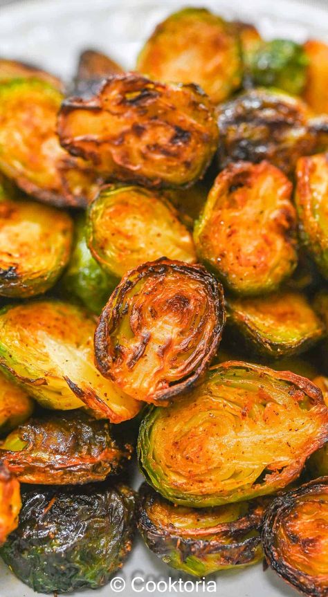 This Air Fryer Brussels Sprouts recipe features boiled sprouts seasoned with paprika, garlic powder, and salt, then air-fried for a crispy, tender texture—deliciously healthy and easy to prepare! How To Make Brussel Sprouts In Air Fryer, Pan Fried Brussel Sprout Recipes, Crispy Brussel Sprouts Air Fryer, Brussel Sprout Recipes Healthy, Crispy Brussel Sprouts Oven, Frozen Brussel Sprouts Air Fryer, Brussel Sprout Recipes Air Fryer, Air Fryer Brussel Sprout Recipes, Brussel Sprouts In Air Fryer