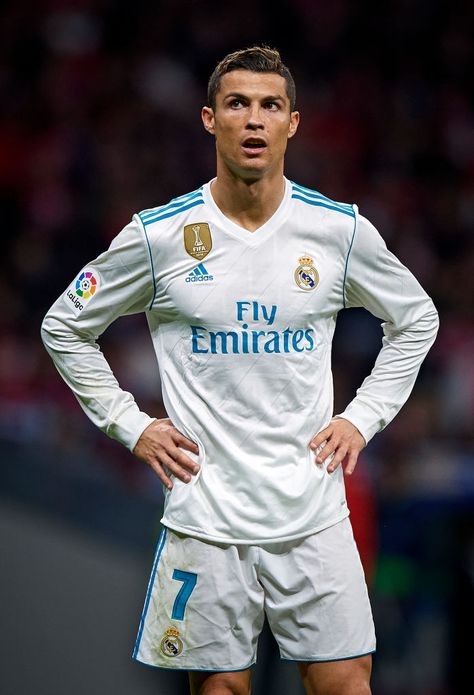 MADRID, SPAIN - NOVEMBER 18: Cristiano Ronaldo (R) of Real Madrid looks on during the La Liga match between Atletico Madrid and Real Madrid at Wanda Metropolitano Stadium on November 18, 2017 in Madrid, Spain. (Photo by fotopress/Getty Images) Real Madrid Kit, Cristiano Jr, Cr7 Wallpapers, Cristiano Ronaldo Junior, Fly Emirates, Ronaldo Juventus, Ronaldo Junior, Ronaldo Real Madrid, Ronaldo Real