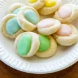 Riley's Bakery thumbprint cookies Thump Print Cookies Easy, Tea Cookies With Icing, Iced Thumbprint Cookies Recipe, Icing Thumbprint Cookies, Thumbprint Cookies Recipe With Icing, Soft Thumbprint Cookies, Easter Thumbprint Cookies, Iced Thumbprint Cookies, Scoop Cookies