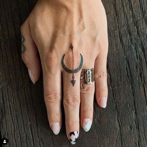 These Sagittarius tattoo ideas show off the personality of this fire sign with images of archers, bows and arrows, constellations, and more. #tattoos #sagittarius #tattooideas #astrology Sagittarius Simple Tattoo, Sagittarius Tattoo Finger, Taurus And Sagittarius Tattoo Combined, Tattoos For Women Sagittarius, Sagittarius Fire Tattoo, Fire Signs Tattoo, Sagittarius Moon Tattoo, Sagittarius Hand Tattoo, Sagitarius Tattoo Ideas Sagittarius