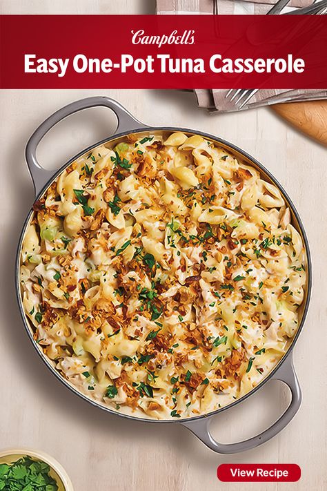 The magic of this Easy One-Pot Tuna Casserole is that you add the pasta dry, and it cooks right in the skillet! Sauté some celery in butter for the first layer of flavor, add the soup, water and pasta and simmer! The pasta soaks up some of the creamy sauce for extra flavor. Add the tuna and sprinkle with a topping of cheese and crushed croutons- this Easy One-Pot Tuna Casserole couldn't be easier! Pescatarian Dinners, Campbell Recipes, Bag Meals, June Recipes, Creamy Tuna Pasta, Campbells Soup Recipes, Campbells Recipes, Work Recipes, Easy Delicious Dinners