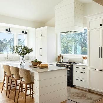 White Cottage Kitchen, White Kitchen Counters, White Shiplap Wall, Picture Window, Kitchen Counter Stools, Black Kitchen Cabinets, White Shiplap, Stoves Range, Kitchen Hoods