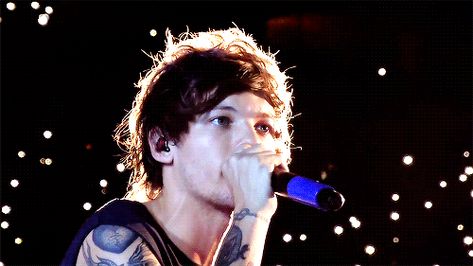 You will see Louis’s angelic eyes staring off into the distance, basking in the light of a thousand angels smiling down upon his blesséd face. Eyes Staring, The Dark One, One Direction Concert, Louis Williams, Look At The Stars, 1 Direction, Light Of My Life, Larry Stylinson, Liam Payne