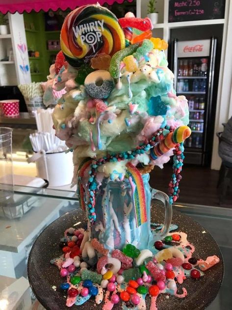 This is the most insane freak shake we've ever seen! Crazy Shakes, Unicorn Desserts, Everything But The Kitchen Sink, Candy Drinks, Ice Cream Candy, Rainbow Food, Milkshake Recipes, Unicorn Foods, Milk Shake