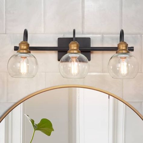 Earthy Bathroom, Bathroom Vanity Lights, Farmhouse Transitional, Vanity Lights Bathroom, Vanity Lights, Bathroom Wall Sconces, Bathroom Light Fixtures, Ceiling Fan In Kitchen, Brass Accents