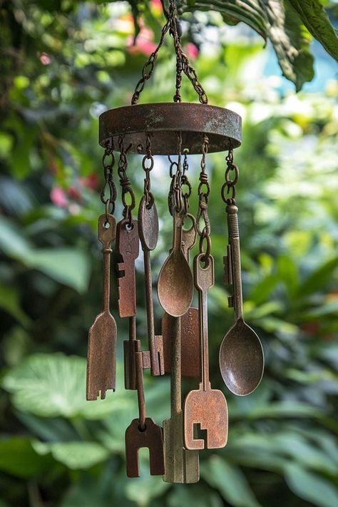 Crafting Wind Chimes from Recycled Items is a creative and eco-friendly project for any garden enthusiast! 🎐🌿 Repurpose old materials into beautiful wind chimes, adding both charm and soothing sounds to your garden. Easy to make and bursting with character, these DIY wind chimes are perfect for sustainable crafters. Start crafting today! 🌿🔧 #GardenDIY #RecycledCrafts #SustainableLiving #CreativeGardening Windchimes Homemade, Old Key Crafts, Wind Charm, Key Crafts, Wind Chimes Homemade, Old Key, Old Keys, Diy Wind Chimes, Home Garden Design