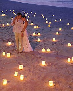 Light it up if you plan to spend some of the evening hours on the beach. All you need are white paper bags, sand, and votive candles. It's simple,  inexpensive, and a beautiful way to set the mood! Hiasan Perkahwinan, Pose Fotografi, Have Inspiration, Bali Wedding, 인물 사진, Caster, The Sand, Wedding Bells, Wedding Pictures