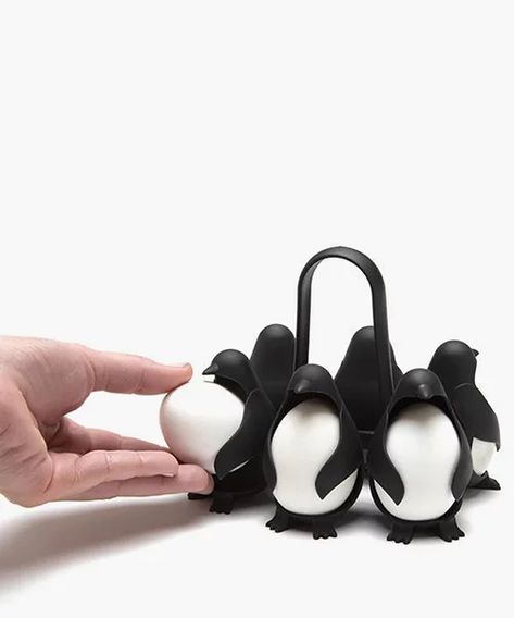 penguin-shaped egg-holder and boiler designed to dive into hot water Kitchen Inventions, Penguin Egg, Egg Cookers, Silk Lampshade, Egg Cooker, Quirky Decor, Fridge Storage, Soft Boiled Eggs, Egg Basket