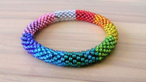 How To Make A Seed Bead Rope Bracelet - YouTube Round Seed Bead Bracelet Diy, Cord And Bead Bracelets, Rope Bead Bracelet, Crochet Beaded Rope Patterns Free, Beaded Rope Tutorial, Seed Bead Patterns Free Bracelets, Rope Bracelets Tutorial, Rope Bracelets Diy, Beading Crochet