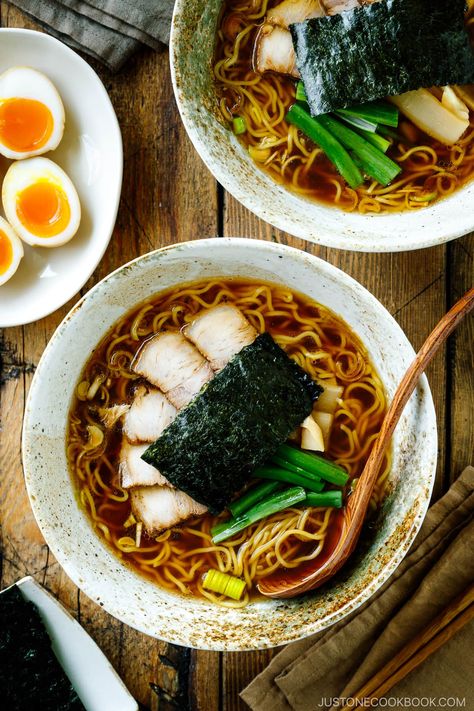 Simmered with pork bones and aromatics for hours, this Shoyu Ramen is the classic Tokyo-style soy sauce-flavored ramen topped with chashu, seasoned bamboo shoots, green onion, and nori. Despite the long hours of inactive simmering time, active cooking is just 15 minutes and it's super easy to make this authentic Japanese ramen. #shoyuramen #ramen #tokyo | Easy Japanese Recipes at JustOneCookbook.com Easy Homemade Ramen, Ramen Easy, Pork Bones, Spring Soups, Easy Ramen, Shoyu Ramen, Tokyo Style, Bowl Of Ramen, Homemade Ramen