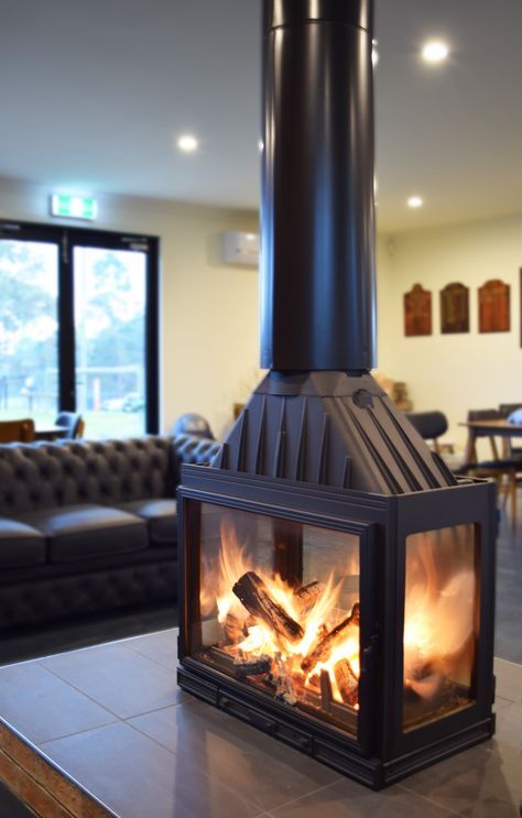 Australia's first FOUR sided wood heater, beautiful from all angles. With its pure cast iron construction, two swinging glass doors and two glass sides, gazing through the dancing flames of the mesmerising Seguin Multivision 8000 cheminee wood fireplace is sure to please all viewpoints no matter of its location. Glass Door Fireplace, Corner Log Burner, Build A Fireplace, Fireplace Logs, Wood Heater, Freestanding Fireplace, Glass Fireplace, Stove Fireplace, Wood Fireplace