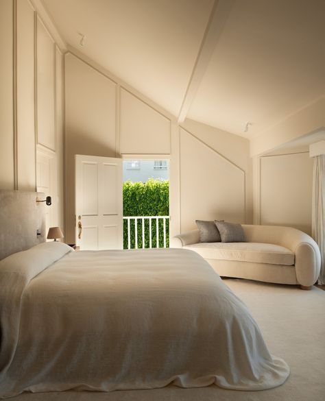 Bradley Adcock | The guest bedroom was one of the only rooms we kept light and bright in our Hollywood Hills project. Welcoming and warm, the slanted… | Instagram Jean Royere, Slanted Ceiling, Hollywood Hills, The Guest, The Room, Guest Bedroom, Hollywood, Ceiling, Sofa