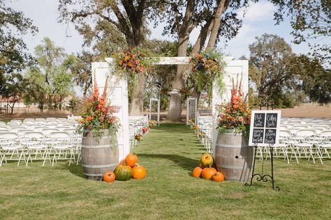 Fabulous Fall Wedding. Vintage Door Entryway, vintage door backdrop, wine barrels, and church pews all available to rent from Blossom Farm Vintage Rentals. Vintage Doors Wedding, Wedding Arch Doors Rustic, Farm Wedding Welcome Sign, Outdoor Wedding Welcome Sign, Vintage Door Backdrop, Wine Barrel Wedding Decor, Barrel Wedding Decor, Entryway Vintage, 2026 Wedding