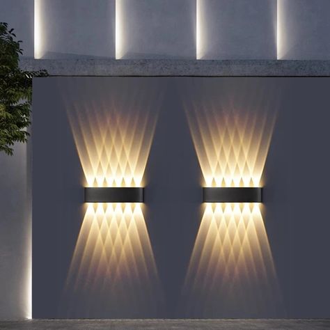 Stunning Lighting Effect! The Theodore Led Garden Wall Light is a versatile and practical light fixture that can be used outdoors. With its IP65 waterproof rating, it can withstand harsh weather conditions, making it ideal for illuminating outdoor spaces such as patios, gardens, and walkways. The diamond light feature allows you to create a wonderful light effect that illuminated your garden in fashion. The Theodore Led Garden Wall Light from Love Decors creates a welcoming atmosphere and the al Wall Outdoor Lighting, Exterior Lights On House Modern, Living Room Wall Lights, Room Wall Lights, Modern Exterior Lighting, Garden Wall Lights, Interior Wall Lights, Decorating A New Home, Exterior Light Fixtures