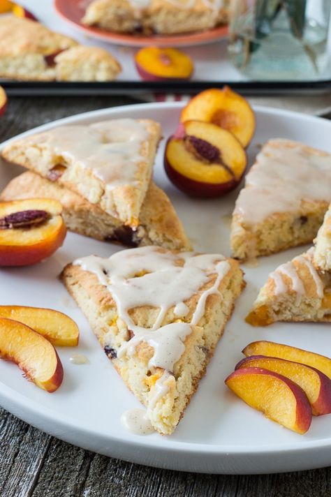 These fruit scones are loaded with fresh nectarines then drizzled with a vanilla bean glaze! Only 30 minutes from start to finish! Nectarine Desserts, Nectarine Dessert, Vanilla Bean Scones, Nectarine Recipes, Fruit Scones, Baked Peach, Homemade Pastries, Fruit Pie, Rabbit Food