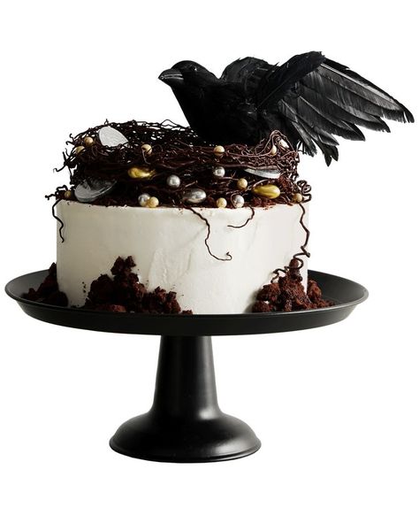 Raven's-Nest Cake | Looking for a Halloween party dessert? Look no further than this moist buttermilk-chocolate cake frosted with vanilla buttercream. Top the cake with a chocolate nest, toasted cake crumbs, shiny candies and a fake raven for a truly festive edible centerpiece.  #food #halloweenrecipes #marthastewart #cake #halloween Nest Cake, Halloween Party Desserts, Halloween Cake Recipes, Buttermilk Chocolate Cake, Chocolate Nests, Pasteles Halloween, Chocolate Cake Frosting, Edible Centerpieces, Themed Recipes