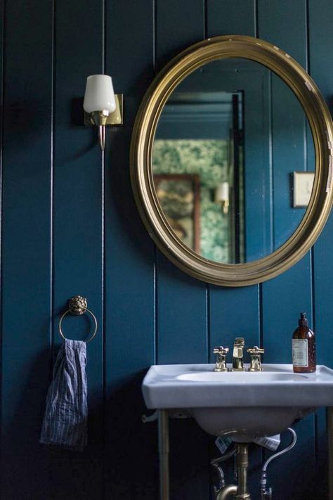 Bathroom with gloss blue timber panelling tongue & groove. Oval mirror Arts And Crafts Bathroom, Inchyra Blue, Dark Blue Walls, Deco House, Downstairs Loo, Downstairs Toilet, Dark Walls, Celebrity Homes, Blue Bathroom