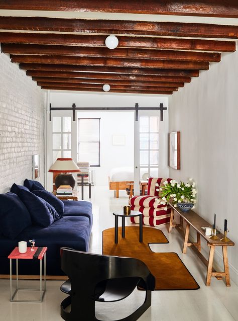 Making a Big Impact on a Small Budget - The New York Times Will Cooper, a partner and the chief creative officer at the New York design firm ASH NYC, painted the wood floor and brick wall in his East Village apartment. “It made a huge difference and changed the whole atmosphere,” he said. Painted Brick Walls, Small Lounge, Wall Brick, Brick Interior, Trendy Apartment, New York Apartment, White Brick, Nyc Apartment, Interior Design Firms