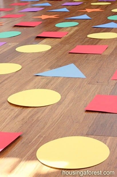 10 Indoor Activities for Preschoolers - 5 Minutes for Mom Indoor Hopscotch Ideas, Shape Hopscotch Game, Preschool Games Movement, Indoor Activities For Preschoolers, Shape Activities Preschool, Shapes Kindergarten, Fun Indoor Activities, Indoor Games For Kids, Shape Games