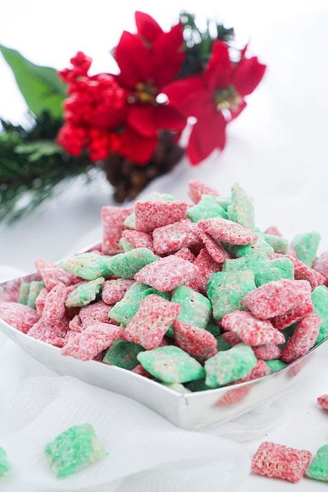 This easy Christmas Puppy Chow is a yummy holiday puppy chow recipe. It is perfect to serve at Christmas parties and other holiday activities. This is a festive puppy chow recipe without peanut butter and uses different colors of frosting to make the Chex snack mix red and green for Christmas. Kids can help make this for edible Christmas gifts and holiday parties! Holiday Puppy Chow Recipes, Puppy Chow Recipe Without Peanut Butter, Christmas Muddy Buddies Recipe, Puppy Chow Without Peanut Butter, Holiday Puppy Chow, Homemade Puppy Chow, Christmas Puppy Chow, Puppy Chow Ingredients, Chex Snack Mix