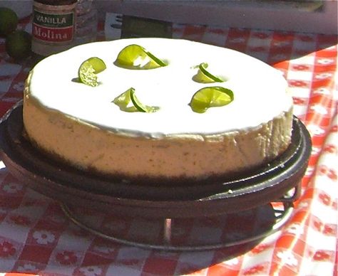 Brian and Lisa Blodgett, past Dutch oven world champs, made this Dutch oven Key Lime Cheesecake for the Association of Food Journalists. Dutch Oven Desserts, Apple Cheesecake Bars, Utah Food, Caramel Apple Cheesecake Bars, Cheesecake Crust, Camping Desserts, Key Lime Cheesecake, Caramel Apple Cheesecake, Apple Cheesecake