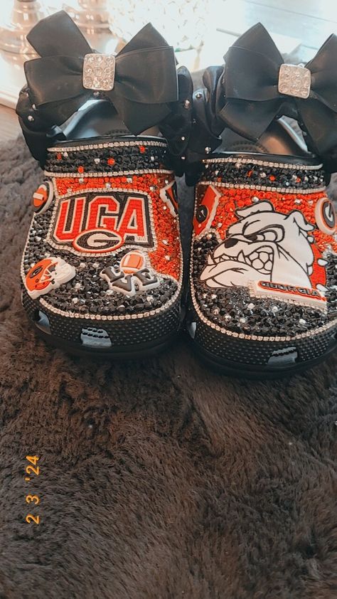 Custom football crocs Custom Crocs For Men, Junk Crocs, Cheer Crocs, Football Crocs, Croc Ideas, Bedazzled Stuff, Croc Decorations, Bedazzled Shoes Diy, Crocs Slides