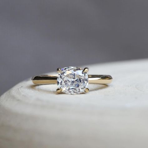 Antique cushion engagement rings