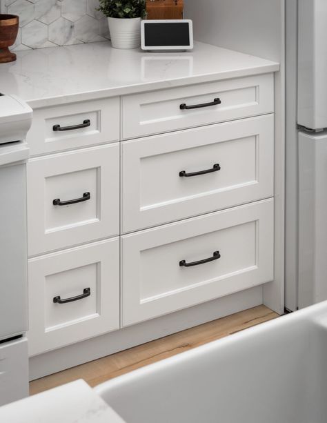 The Top 5 Popular White Cabinet Colors for 2024 - decorcabinets.com White Cabinet Colors, White Cabinets And Black Hardware, White Cabinets With Black Hardware, Popular White Paint Colors, Popular White Paint, Cabinets With Black Hardware, Colors For 2024, Rustic Wood Floors, Classic White Kitchen