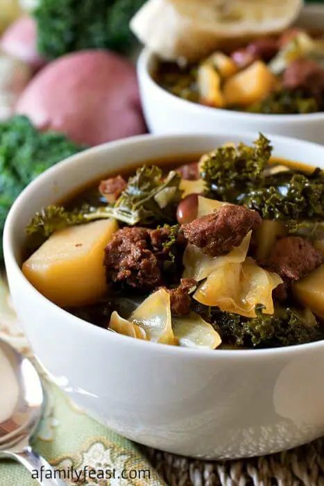 Portuguese Kale Soup - A Family Feast® Beef Goulash Soup, Best Garlic Mashed Potatoes, Vegetable Rice Pilaf, Portuguese Kale Soup, Baked Manicotti, Kale Soup Recipes, Green Tomato Recipes, Beef Goulash, Garlic Cream Sauce