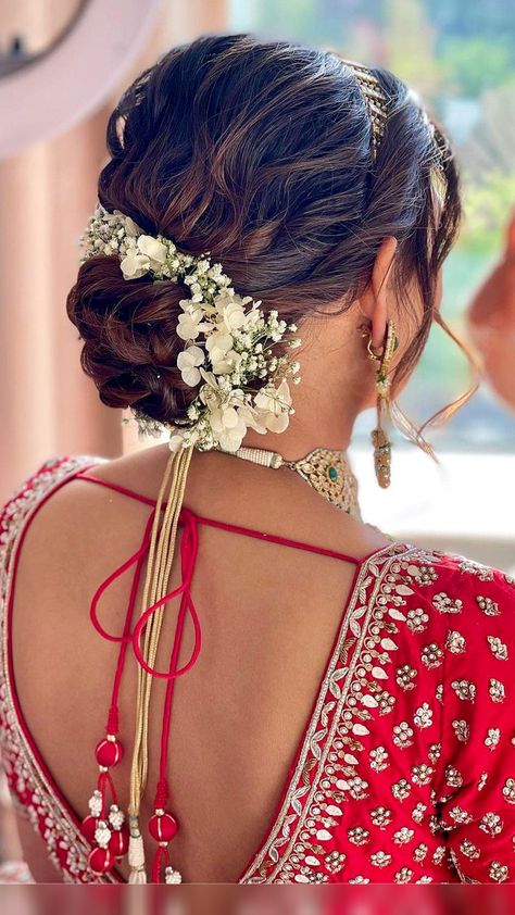 indian bridal hairstyles| indian bridal hairstyles wedding| indian bridal hair| indian bridal hairstyles for reception| indian bridal hair buns with flowers| indian bride hairstyle| indian bride hairstyles| indian bride hairstyle bun| indian wedding hairstyleshairstyles for indian wedding| hairstyles for indian wedding saree| hairstyles for indian outfits| bridal hairstyle indian wedding| bridal hairstyles indian Indian Bridal Bun With Flowers, Indian Bride Updo Hairstyle, Low Bun With Flowers Indian, Saree Bun Look, Indian Wedding Hairdo, Messy Bun For Wedding Indian, Low Messy Bun Wedding Hair Indian, Indian Bridal Hairstyles Updo, Bridal Jooda Hairstyle