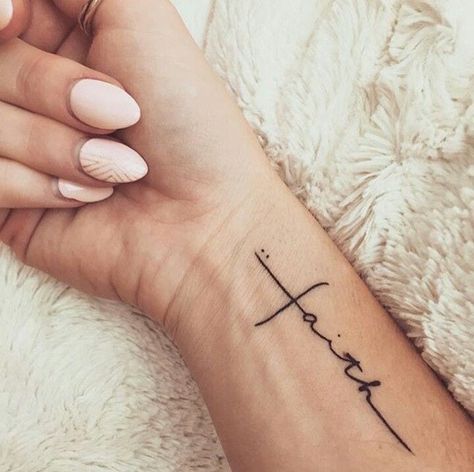 I'm in love with this faith Christian tattoo. What a beautiful, meaningful way to honor our God. Such unique and meaningful tattoo design ideas for women including small cross, verses, symbols on foot, wrist, forearm and more. #wristtattoos #cutetattoos #tattoosforwomen #smalltattoos #tattooideas #minimalisttattoo #christiantattoo #christiantattoosforwomen Tattoo Costillas, Faith Tattoos, Design Tatuaje, Tattoo Thigh, Cross Tattoos For Women, Tattoo Schrift, Hair Tattoo, Foot Tattoos For Women, Meaningful Tattoos For Women