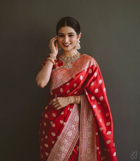 ShimmerMe | Reshma Thomas on Instagram: "Got this stunner dolled up for her engagement! Thanks @irine__thomas for choosing me to be a part of your special day! May you both be blessed with the best always💖 Saree: @sabyasachiofficial Jewellery: @jaipurgems Photography: @jacksonjamesphotography . . . #bridesofshimmerme #keralamakeupartist #bangaloremakeupartist #keralabride #southindianbride #wedmegoodsouth #wedmegoodbride #indianbride #bridesofsabyasachi #sabyasachibride #bridalsarees #bridalmak Red Bridal Saree Look, Red Shalu Saree For Bride, Red Saree Jewellery Ideas, Chilly Red Wedding Saree, Red Engagement Saree, Red Saree Look For Wedding, Bridal Shalu Saree, Red Saree Reception Look, Red Saree Bride