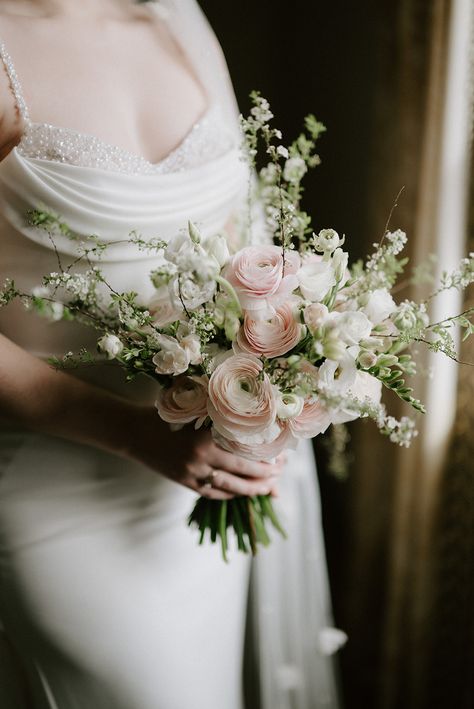 Our beautiful, elegant spring bridal bouquet created with stunning Italian ranunculus & spirea photographed  at the Angel hotel Spirea Flower Bouquet, Ranunculus Bride Bouquet, Wedding Bouquet Ranunculus, Spirea Bouquet, Bride Bouquet Elegant, Italian Wedding Bouquet, Bridal Bouquet Ranunculus, Italian Ranunculus, Ranunculus Bridal Bouquet