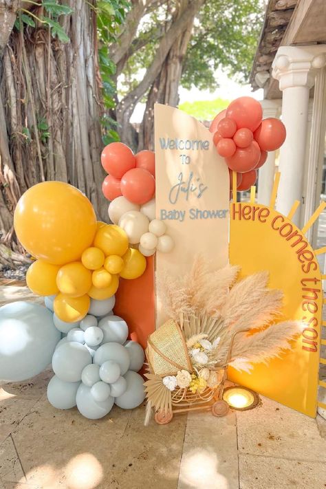 Sunshine-themed baby showers beam with warmth and joy, captivating parents-to-be with a celebration bathed in the glow of happiness.Picture golden sunbursts, vibrant yellow accents, and a cheerful atmosphere that mirrors the anticipation of welcoming a new bundle of sunshine.See more party ideas and share yours at CatchMyParty.com Baby Shower Boys, Gender Reveal Party Decor, Shower Boys, Baby Shower Garcon, Retro Baby Showers, Here Comes The Son, Sunshine Party, Sunshine Baby Showers, Balloon Chain