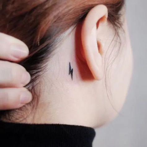 15 Behind The Ear Tattoos That Are Cute And Classy - Society19 Blitz Tattoo, Tattoo Ideas With Meaning, Behind The Ear Tattoo Ideas, Button Tattoo, Lightning Bolt Tattoo, Behind The Ear Tattoo, Lightning Tattoo, Bolt Tattoo, Behind Ear Tattoos