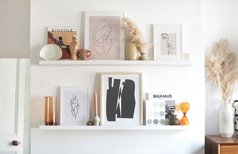 tips on styling a picture ledge Ikea Mosslanda Shelf Ideas, Picture Ledge Sizing Guide, Styling Ledge Shelves, Photo Ledge Decor, Styling Picture Shelves, Ikea Mosslanda Picture Ledge, 60 Inch Picture Ledge Layout, Photo Ledge Above Bed, How To Style A Picture Ledge