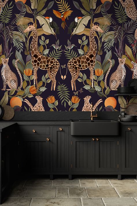 Dark gray kitchen with gold accents and a wallpaper mural that includes giraffes, cheetahs, and oranges.
animal wallpaper mural, 
maximalist wallpaper mural, 
moody wallpaper for walls, 
dark wallpaper, 
unique wallpaper mural, 
wallpaper for bedroom, 
wallpaper for bathroom, 
wallpaper for living room, 
wallpaper for dining room Maximalist Moody, Glam Powder Room, Moody Powder Room, Moody Maximalist, Wall Mural Ideas, Abstract Wall Mural, Maximalist Wallpaper, Maximalist Interior Design, Moody Wallpaper