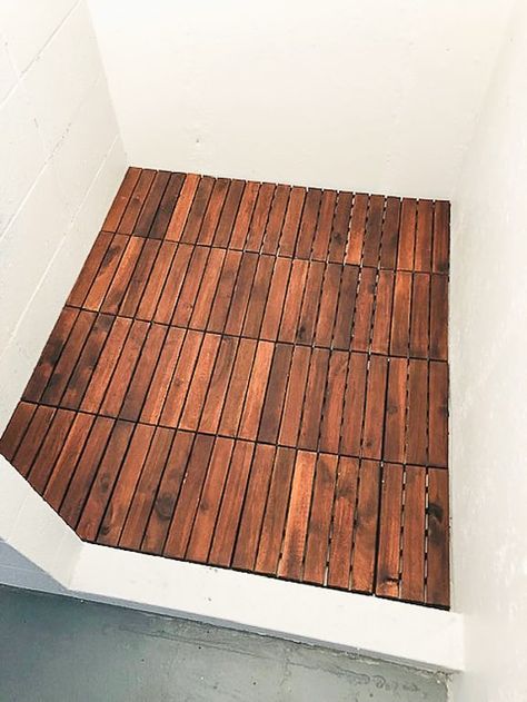 If you are looking for an inexpensive option for waterproof flooring, this post will show you how we laid a wood, waterproof flooring for the flip house shower for under $40. Diy Wood Shower Floor, Cedar Shower Floor, Brick Shower Floor, Diy Shower Floor Ideas Budget, Bamboo Shower Floor, Wooden Shower Floor, Diy Shower Floor, Wood Shower Floor, Bamboo Flooring Bathroom