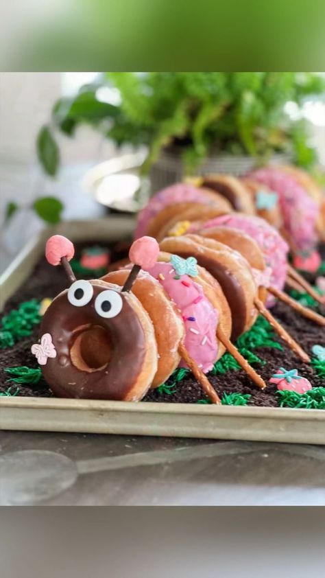 Donut Caterpillar! 🍩🐛 | doughnut, party, birthday | How cute would this be for a kid’s birthday party?! So easy to make, too! | By Neurotic Mom Donut Caterpillar Cake, Doughnut Caterpillar Cake, Birthday Doughnut Ideas, Donut Caterpillar, Doughnut Party Ideas, Birthday Donuts Ideas, Donut Birthday Party Cake, Donut Animals, Donut Cake Birthday