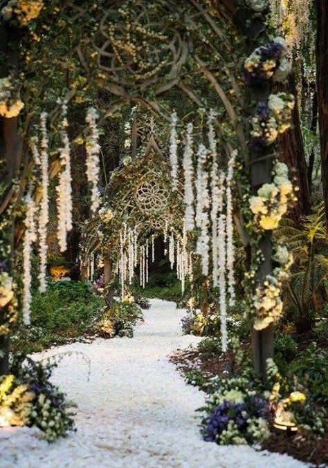 a unique pathway to the ceremony or reception space with arches with vines and floral garlands hanging down Enchanted Forest Decorations, Cottage Core Wedding, Twilight Wedding, Cottagecore Wedding, Forest Theme Wedding, Enchanted Forest Wedding, Extravagant Wedding, Enchanted Wedding, Forest Decor