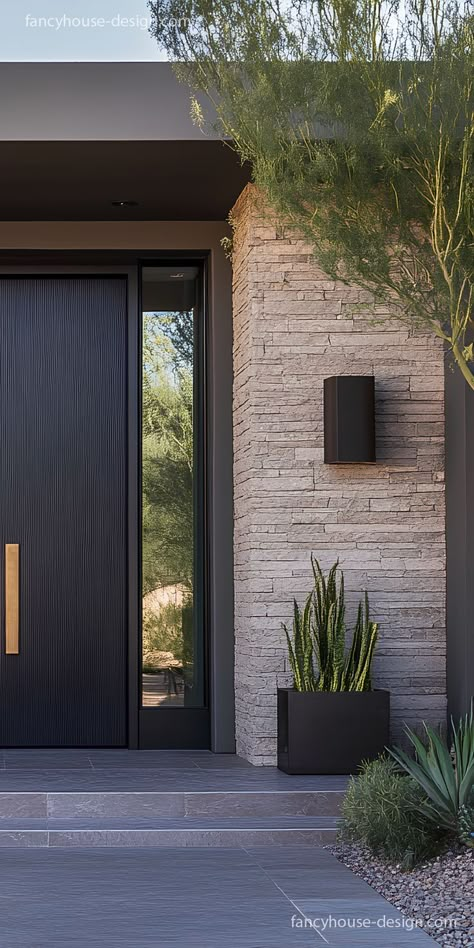 A sleek front door adds a fresh look to the entryway. The sophisticated entry door features clean lines and bold hardware, giving the entryway a contemporary touch. Door Design Color, Modern Front Door Design, Modern Front Door Ideas, Modern Front Doors, House Front Door Design, Modern Bungalow Exterior, Contemporary Front Doors, Bungalow Style House Plans, Contemporary House Exterior