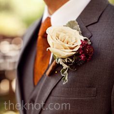 I like this suit color with the orange combo Fall Groomsmen, Fall Boutonnieres, 1920 Style, Burnt Orange Weddings, Rose Boutonniere, Orange Tie, Garden Rose, Orange Wedding, Fall Wedding Colors