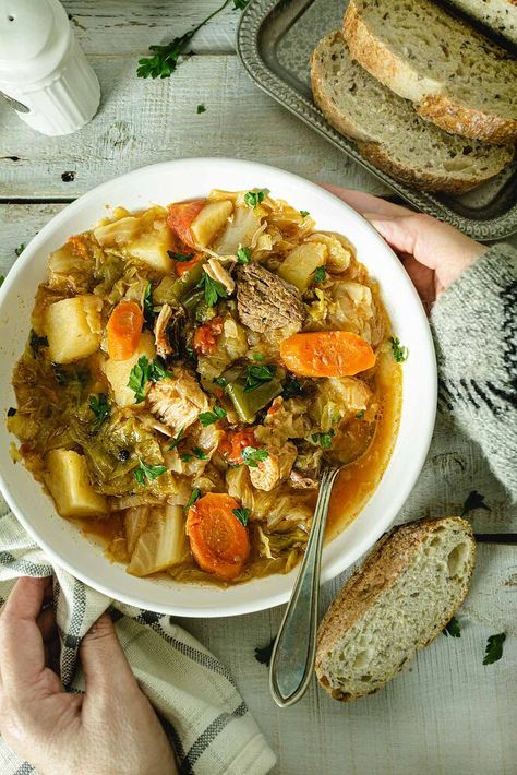 You will love this delicious, belly-warming Bosnian Cabbage Stew recipe loaded with layers of chunky meat and vegetables. It's a no-stir "Set it and Forget it" kind of meal the whole family will love! Savor every satisfying mouthful of this heart dish with its melt-in-your-mouth meat and fork-tender veggies, flavored modestly with herbs and spices. Pair this cabbage stew with your favorite homemade bread so you can polish off all that yummy broth!﻿Making this hearty cabbage stew… Kiflies Recipe, Spaghetti Nests, Nigerian Rice, Meatballs Appetizer, Pork Stew Meat, Okra Stew, Cabbage Stew, Malva Pudding, Italian Cookie