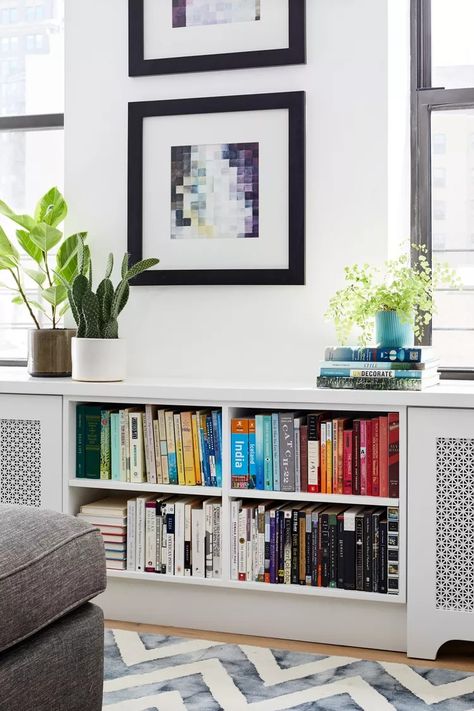 31 Built-In Bookshelf Ideas for Every Room in Your Home Low Bookshelf, In Home Library, Small Home Library, Low Bookshelves, Bookshelf Ideas, Bookcase Tv Stand, Dark Paint Colors, Small Ottoman, Library Shelves