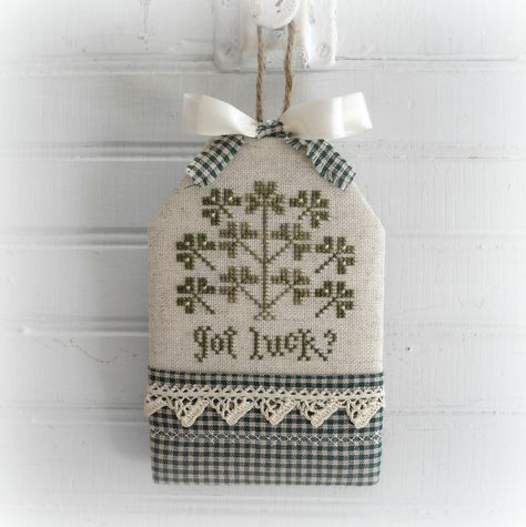 completed cross stitch shamrock door hanger. Cross Stitch Door Hanger, Shamrock Cross Stitch, Shamrock Bouquet, St Patricks Day Door Hanger, Shamrock Door Hanger, St Patrick's Cross, Stitch Decor, Irish Cross, Cross Eyed